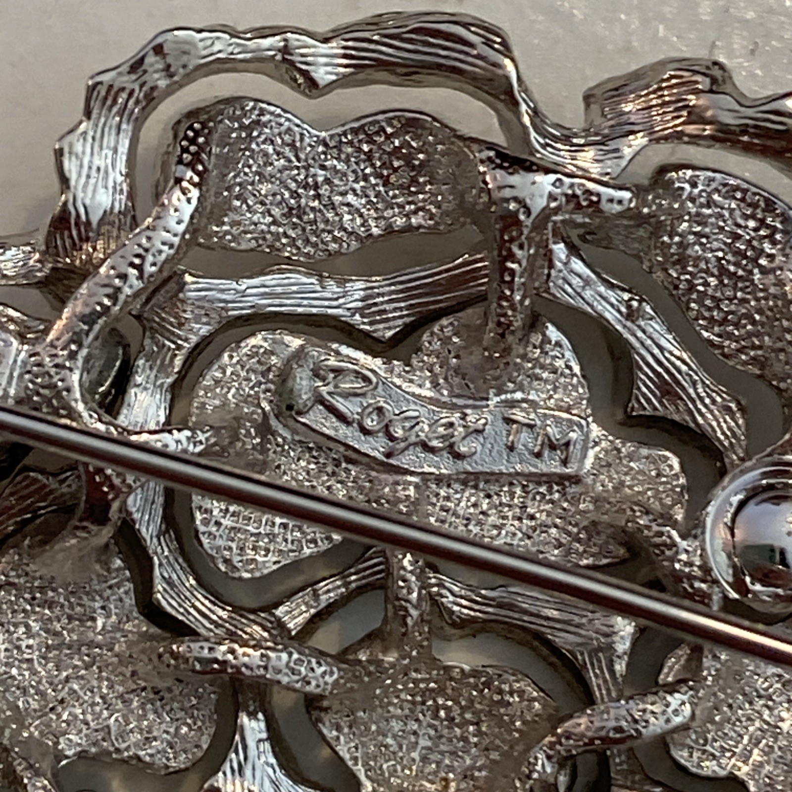Vintage Roget TM Silver Tone Metal Modernist Perforated Pattern Branch Shiny Pin