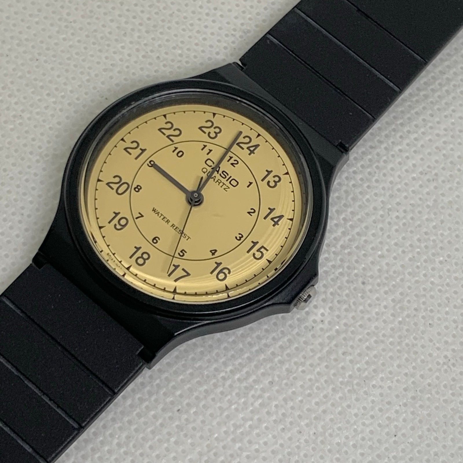 Casio MQ-24-9B Analog Watch Parchment Dial 33mm Retro unisex black band running