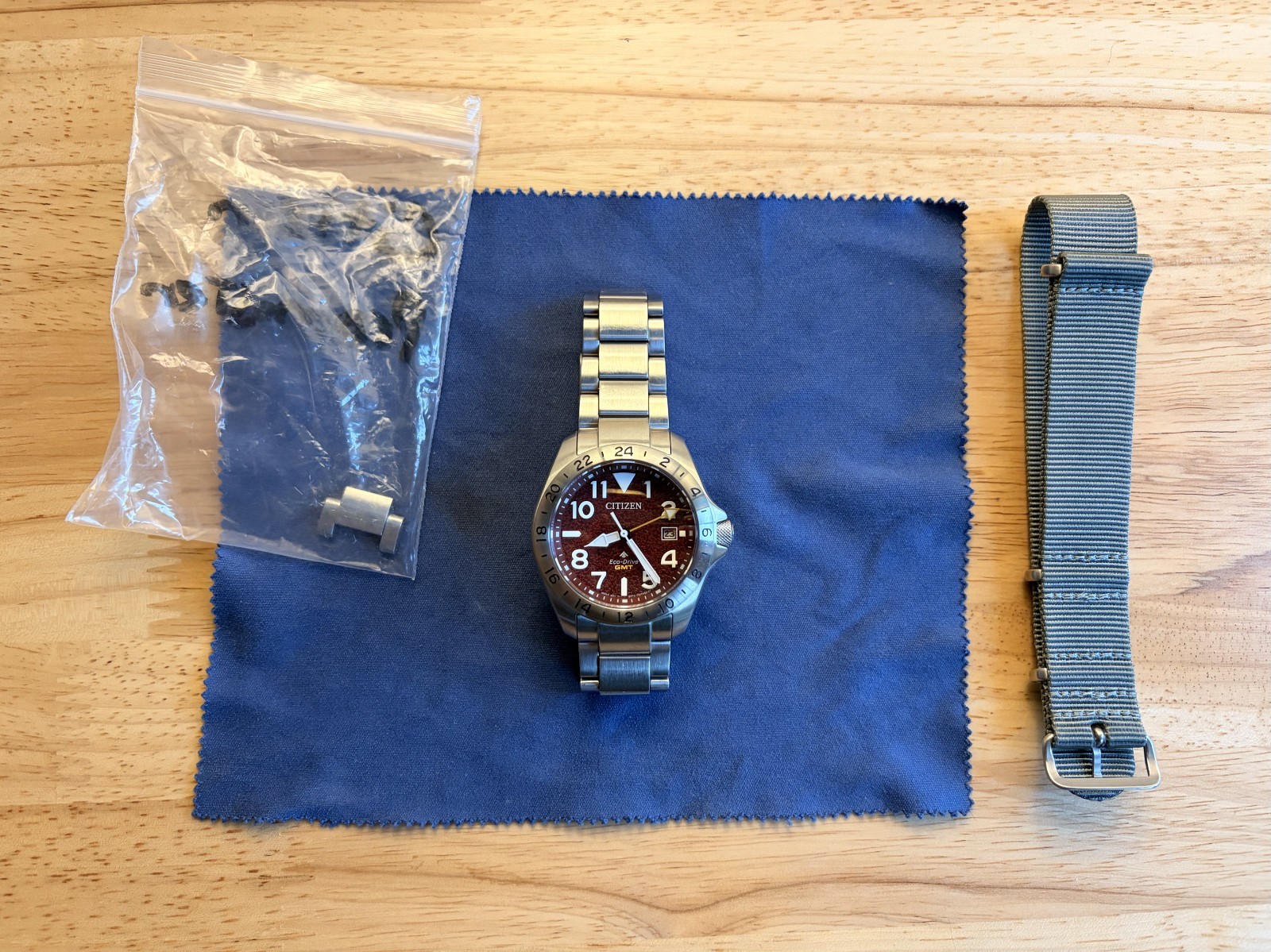 Citizen Promaster Land GMT Eco-Drive Red Dial Mens Watch BJ7150-50W