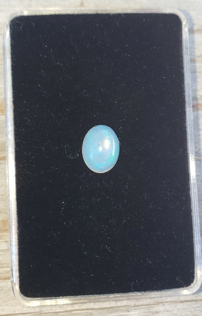 Ethiopian Crystal Nice Play-Of-Color 1.40Ct. Fire Opal Oval Cabachon Solitaire!