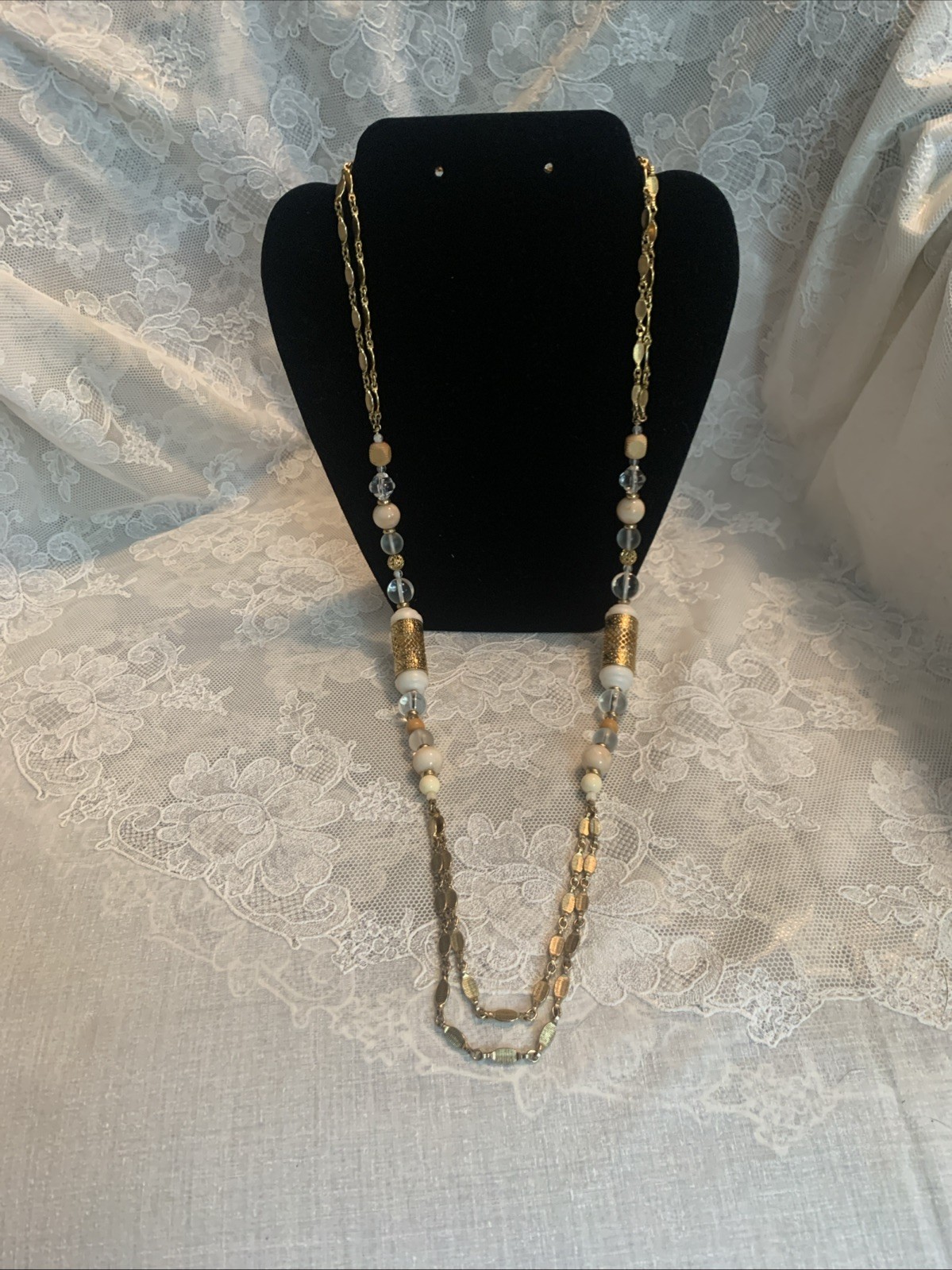1928 Shiny Gold Tone 36″ Double Chain Necklace Clear, Beige, Gold, Wood Beads