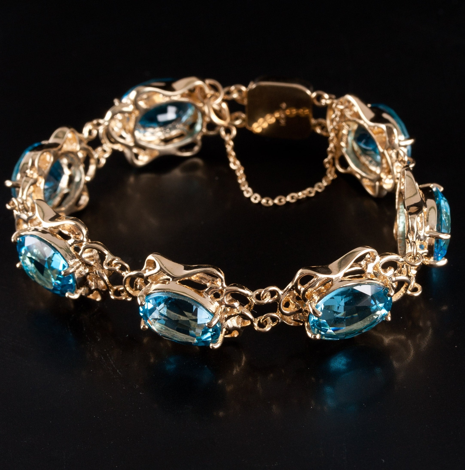 14k Yellow Gold Large Oval Swiss Blue Topaz Bracelet 42.0ctw 29.6g 6.5″ Length