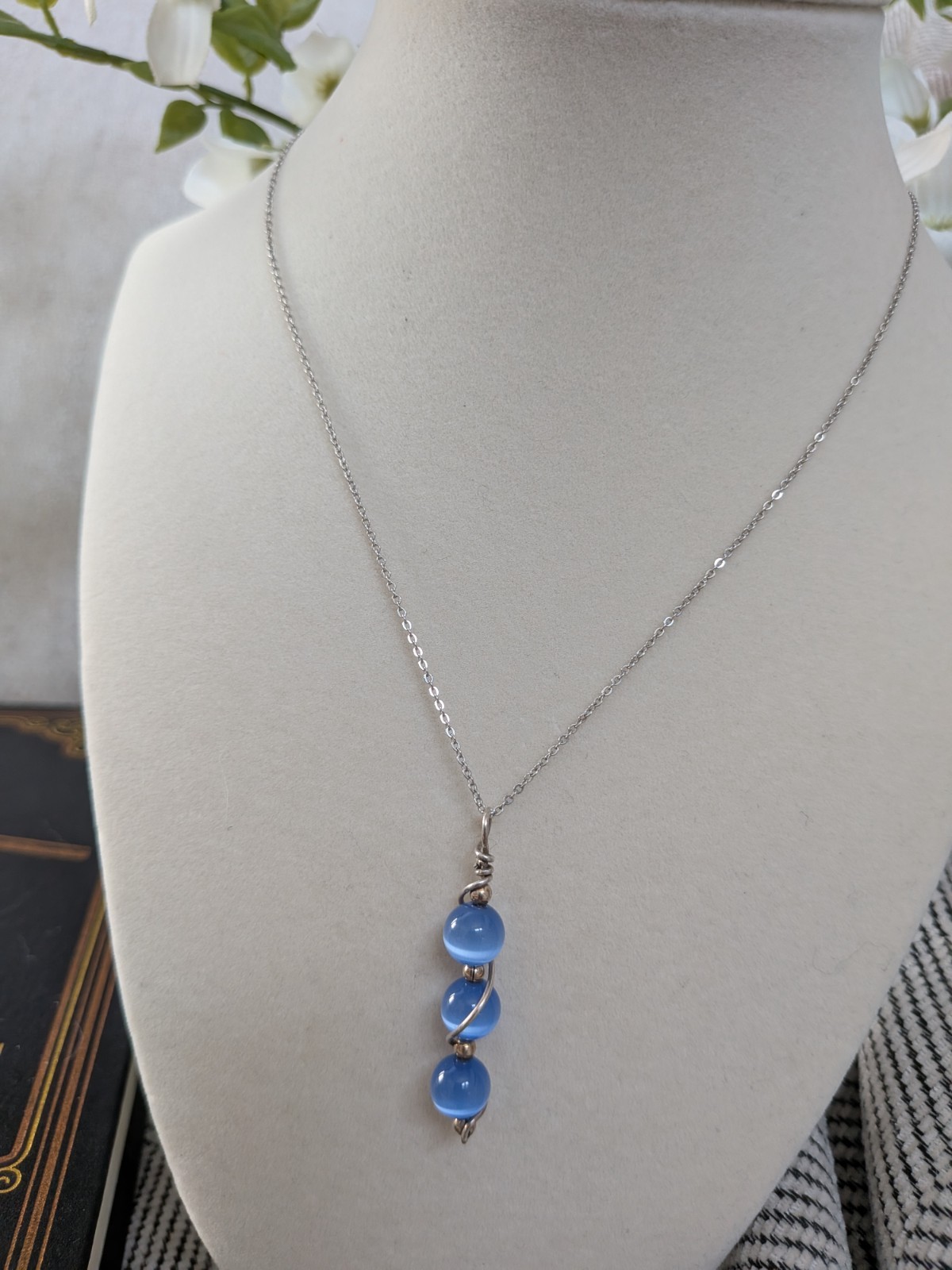 .925 necklace handcrafted pendant with three light blue cat-eye stone glass