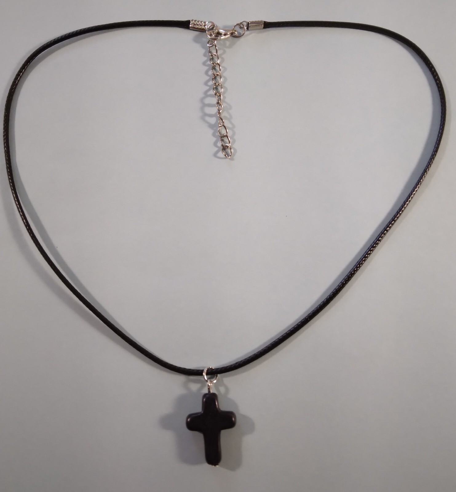 Black cross on 17 1/2 – 19 1/2 inch Black Cord type necklace 274776