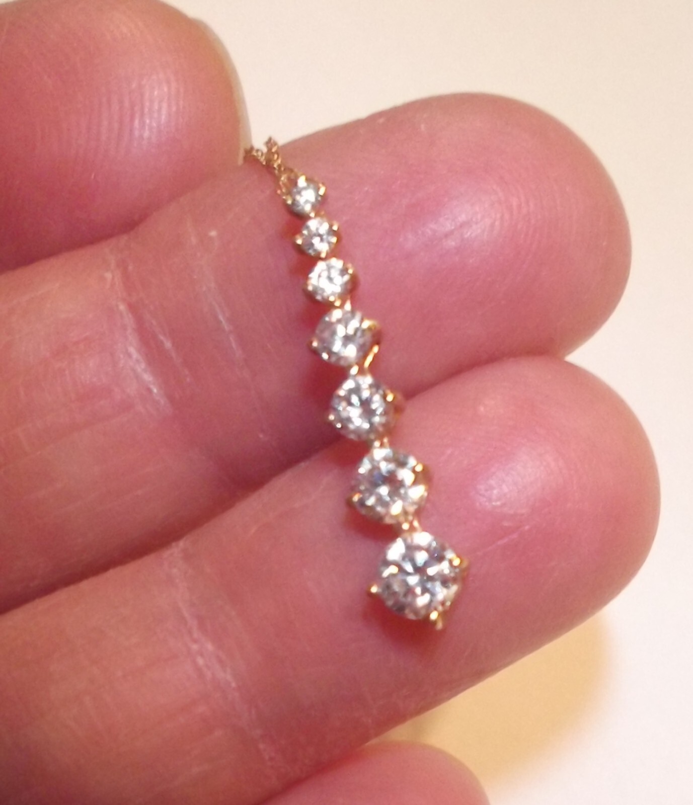 10K Yellow Gold 7 Graduating CZ Simulated PENDANT on 20″ 10K Chain