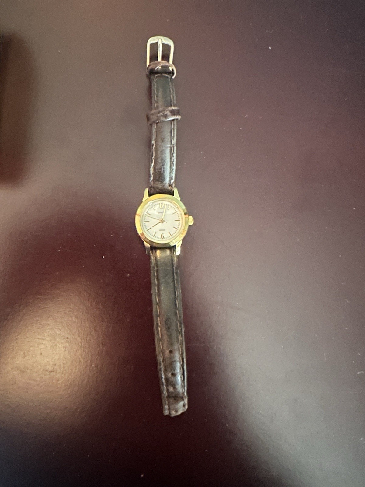 Timex Indiglo Women’s Quartz Analog Watch Gold Case Black Leather Strap 30M