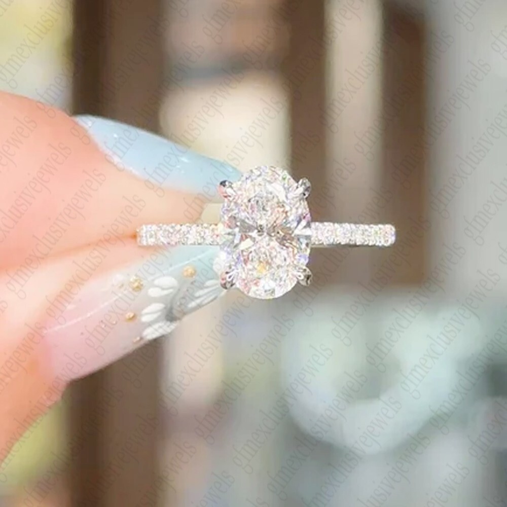 1.64 TCW Oval Cut Moissanite 4-Prong Engagement Ring In Solid 14k White Gold