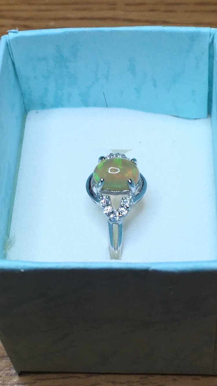 #138B- 0.95ct Genuine Ethiopian Welo Opal set in a Size 8.5 Sterling Silver Ring