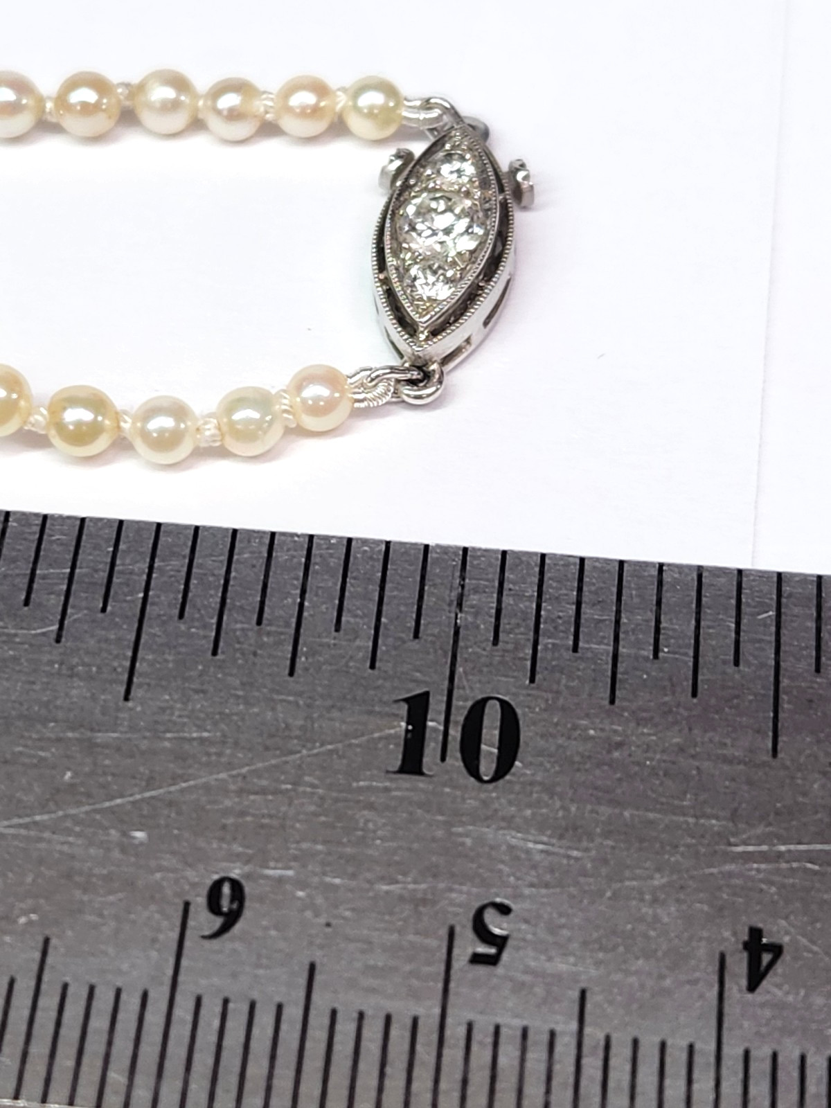 VINTAGE 2.50-8.00mm AKOYA Cultured Pearl & Diamond Graduated 20″ Strand Necklace
