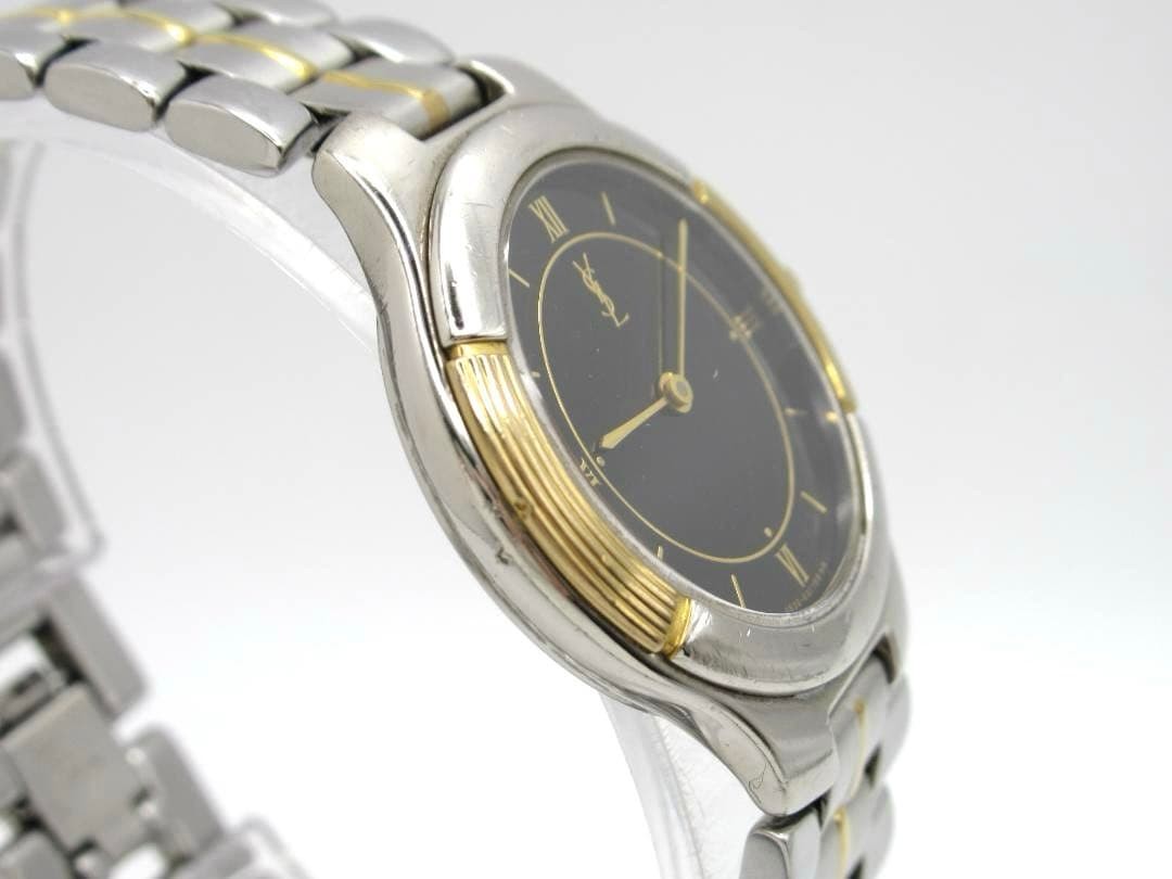 Yves Saint Laurent watch 4620-E66661Y, black dial, working condition.