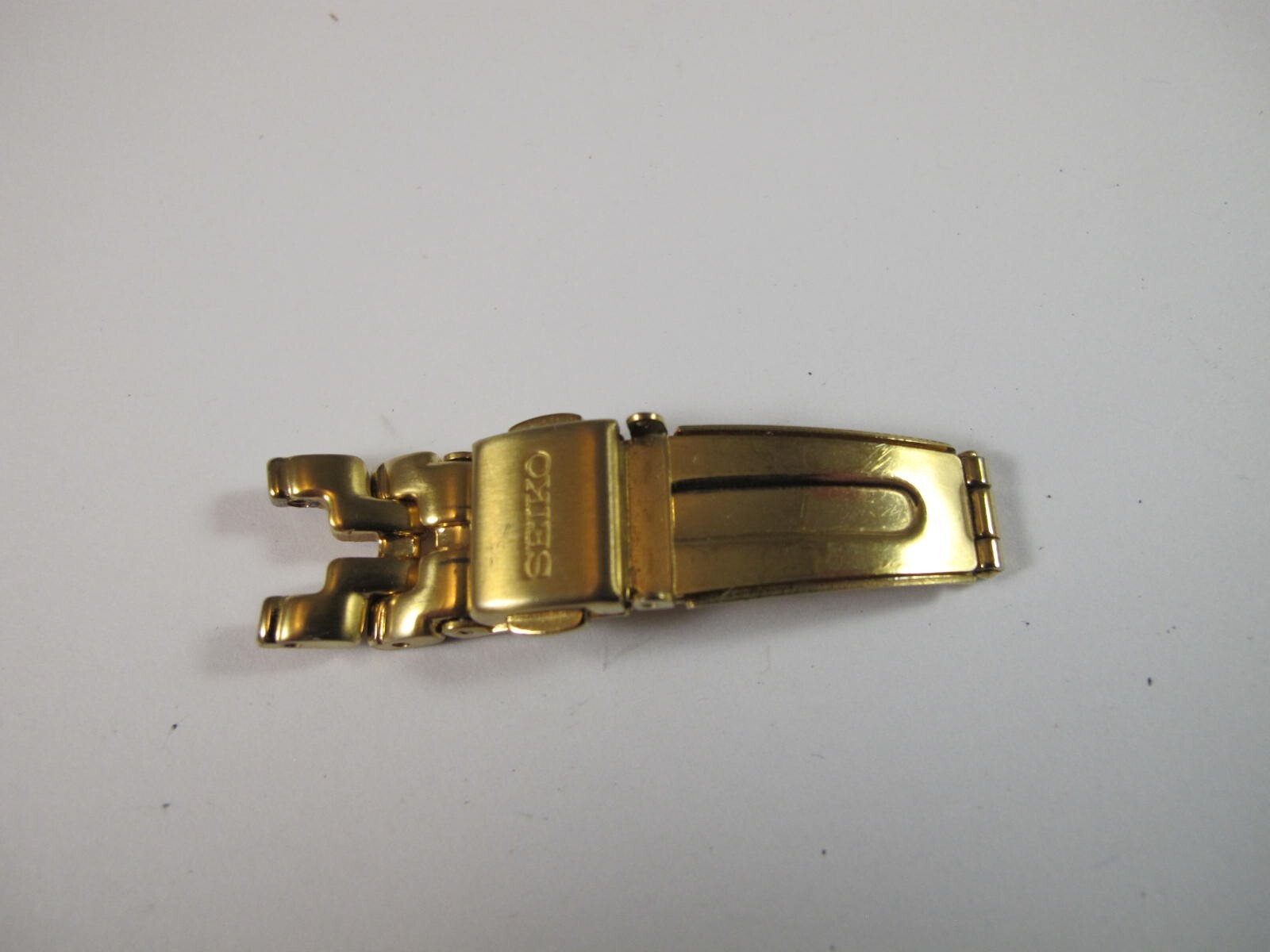 SEIKO LADIES SMALL PUSH BUTTON GOLD TONE DEPLOYANT CLASP