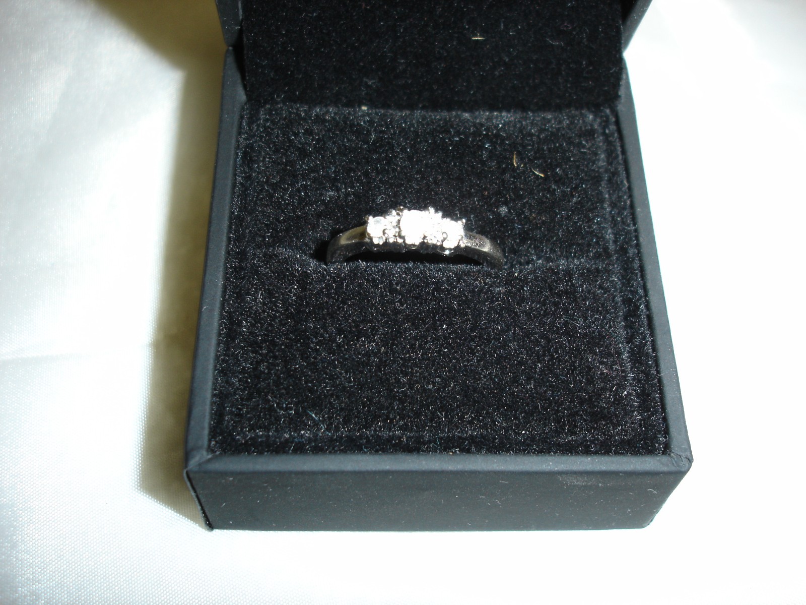 1OK WHITE GOLD AND .5 CTW 3 DIAMOND RING IN SIZE 6.75