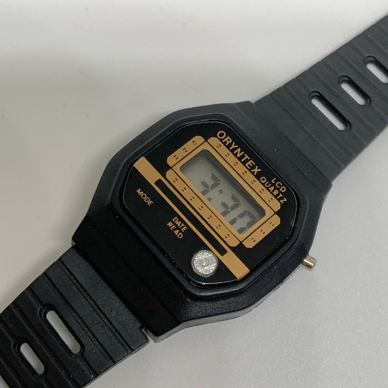 Vintage Oryntex Lcd quartz digital kids/women watch 26mm black tone running