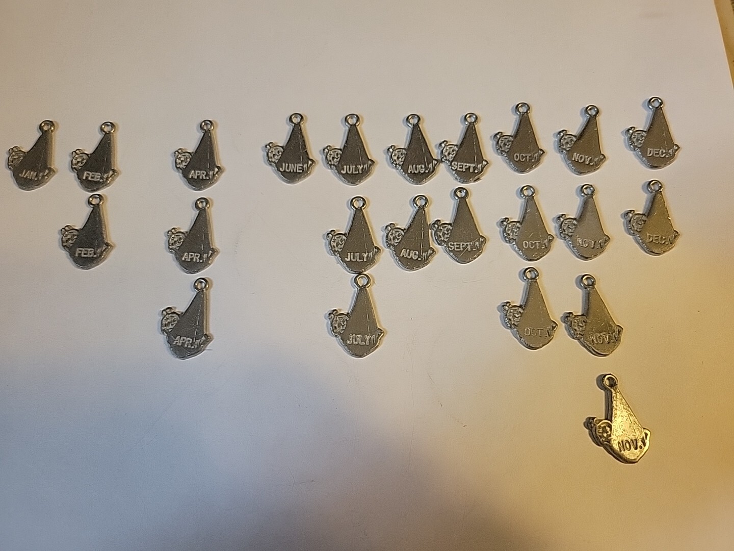 23 Metal STORK BABY Charm Pendants 10 Months VINTAGE 1st Of Month Dates 1 Inch