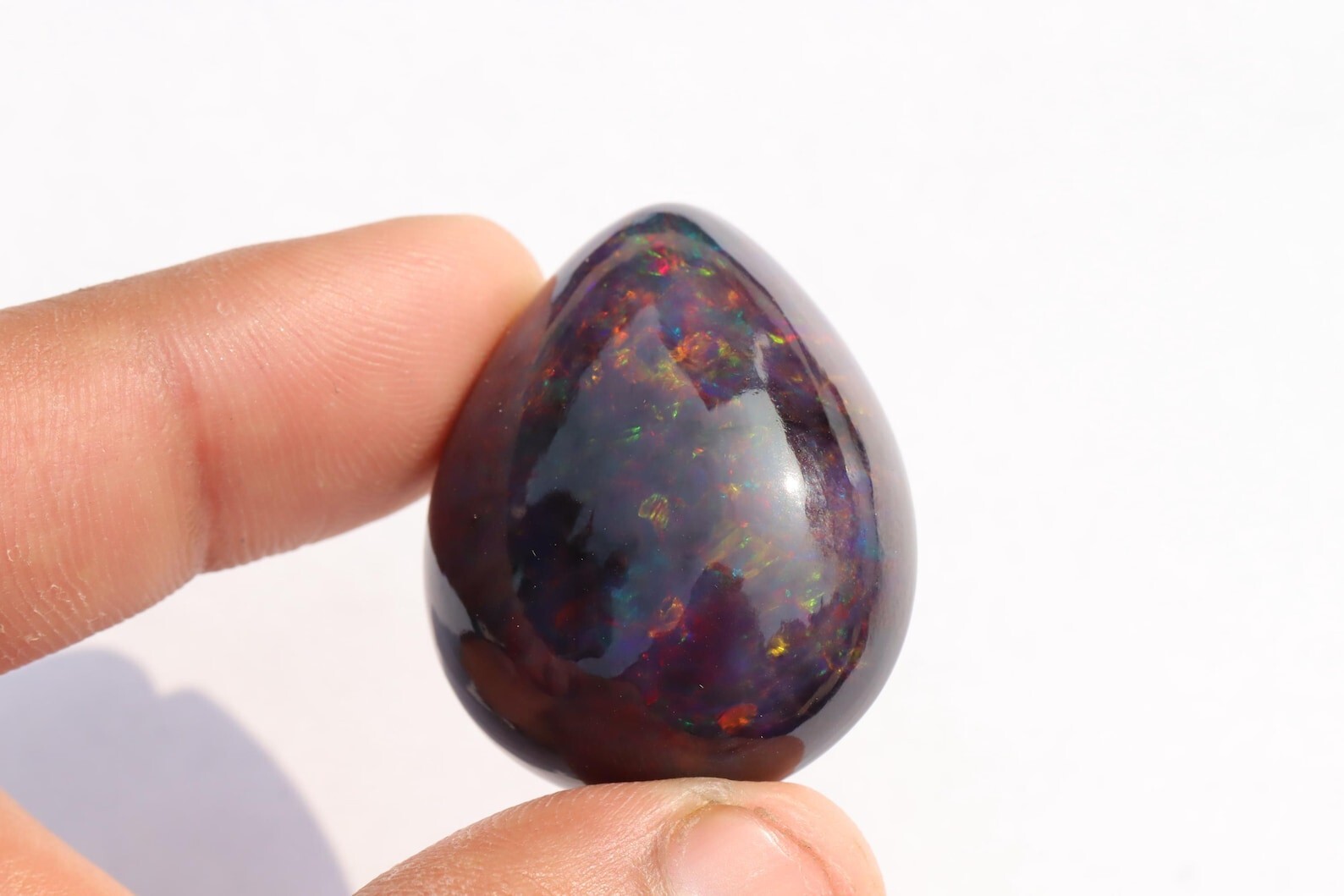 59.95 Carat Ethiopian Black Opal Cabochon 31x26x15 MM Pear Shape Welo Fire Opal