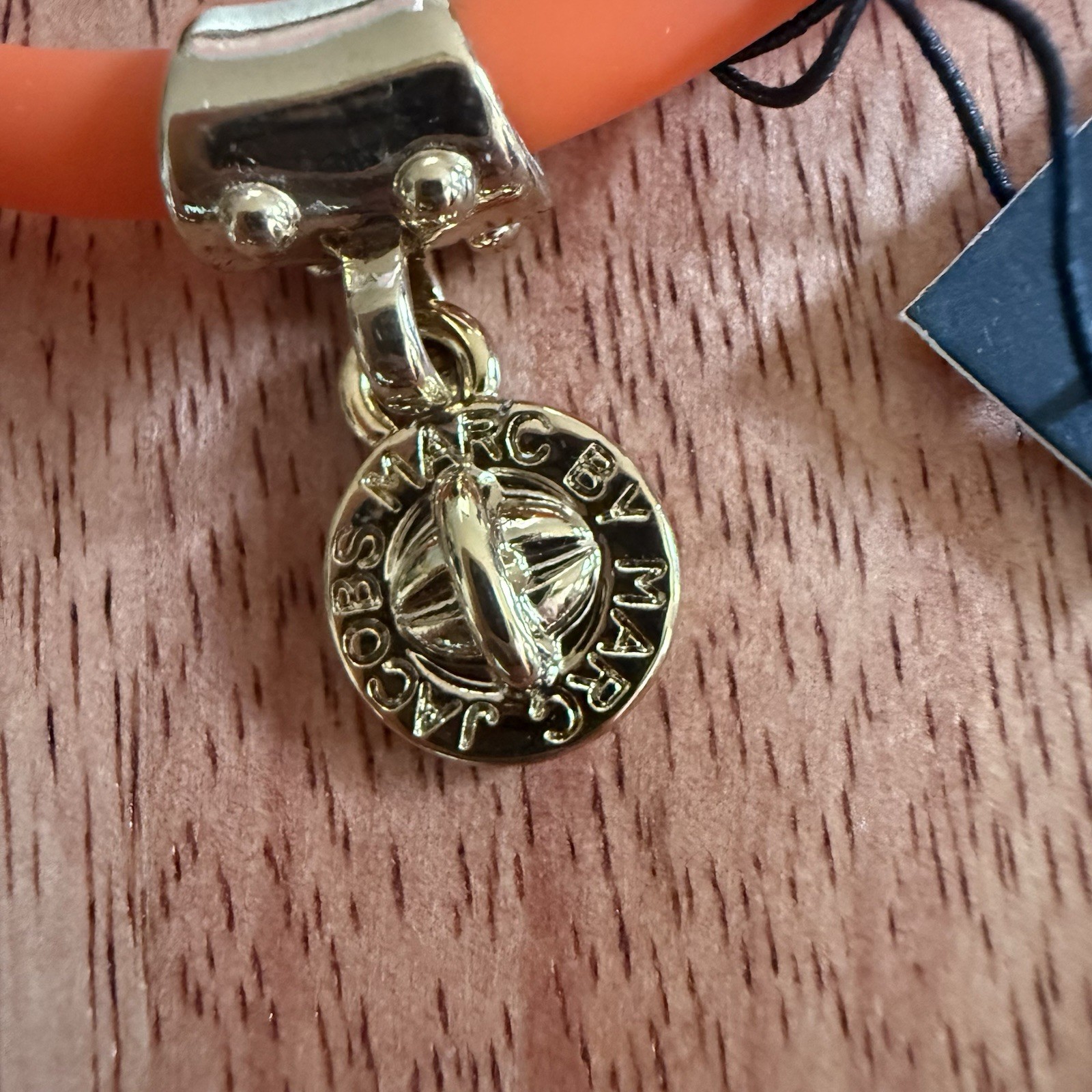 Marc by Marc Jacobs Orange Elastic Silicone Bracelet w/ Gold-Tone Logo Charm NWT
