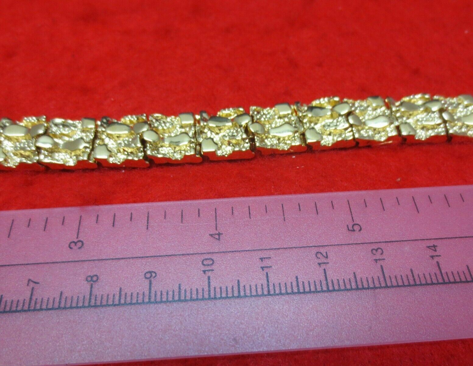 14 KT GOLD PLATED 7 INCH NUGGET BRACELET ABOUT 1/2 INCH WIDE WT. 43 GMS N-100