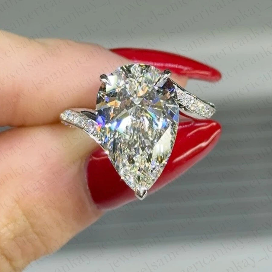 3.98 TCW Pear Cut VVS1 Moissanite Bypass Engagement Ring 14K White Gold Plated