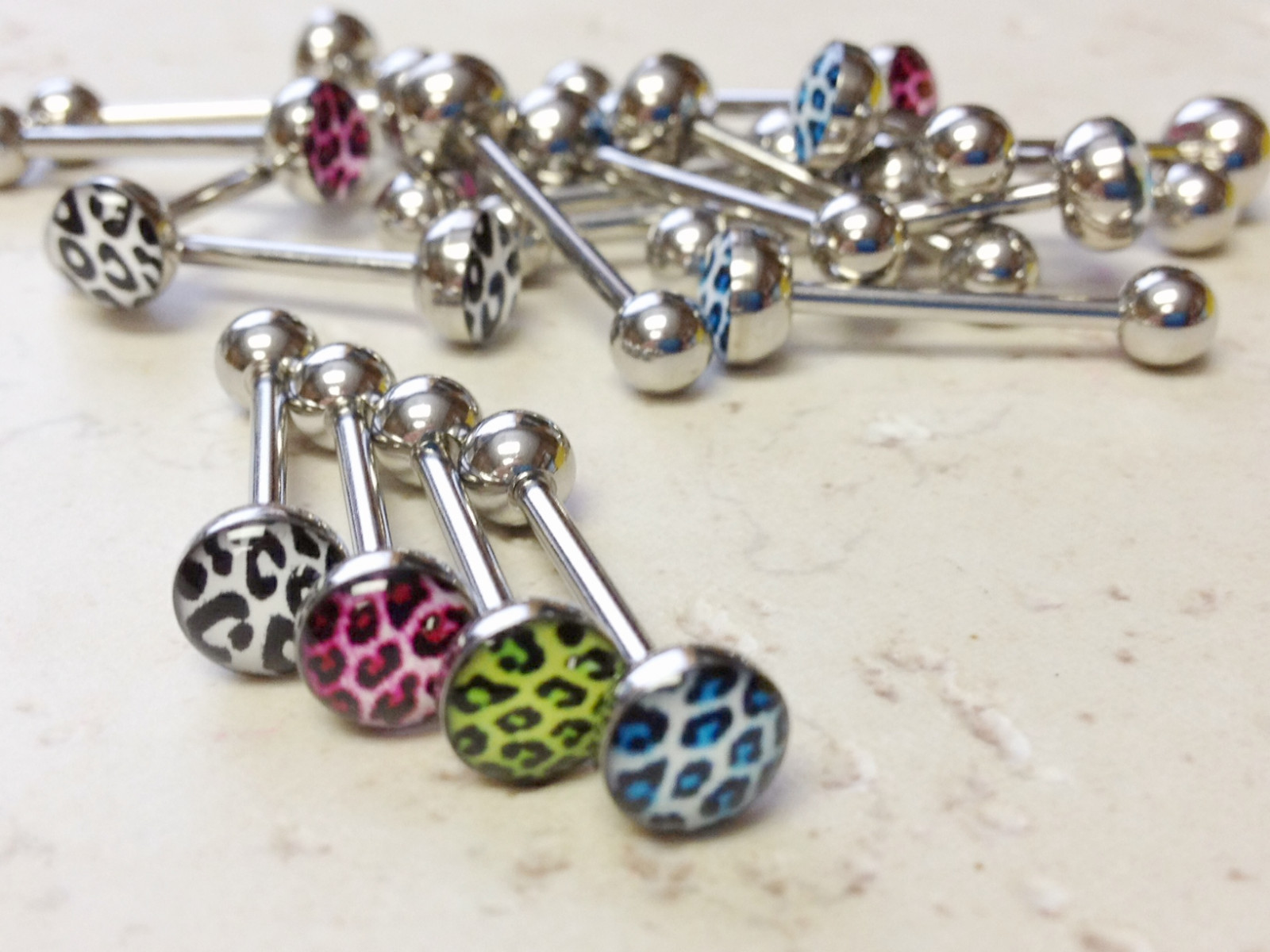 T#119 – 20pc Leopard Skin Logo Tongue Rings Wholesale Tounge Body Jewelry
