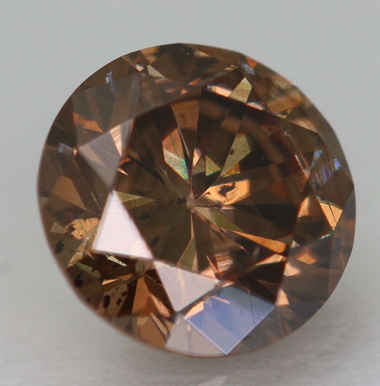 0.64 Carat Yellow Brown VS2 Round Brilliant Natural Enhanced Diamond 5.49m VIDEO