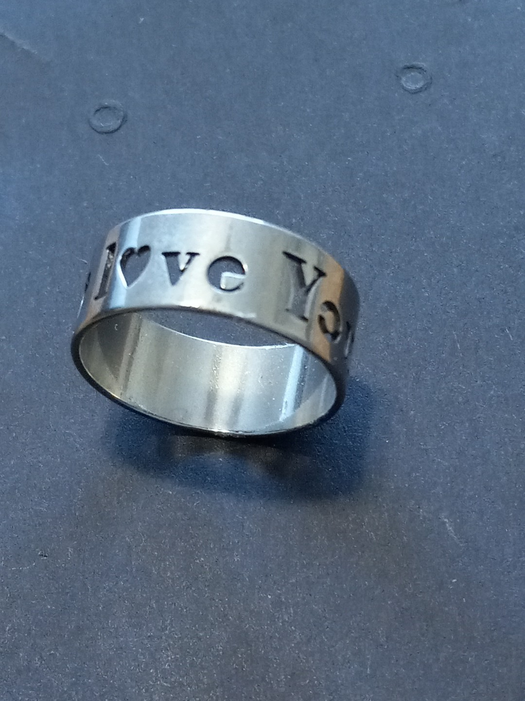 Stainless Steel Fashion Ring – Stamped Love You. 7mm Wide. Size 5.5 (B20)