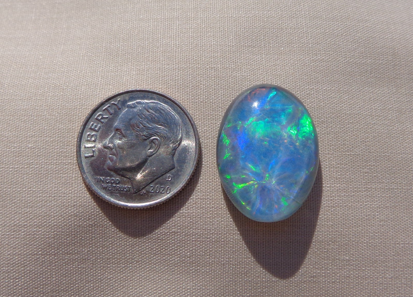 Spencer Idaho Opal Triplet 15X20mm with a Blazing Green Fire in a Galaxy Pattern
