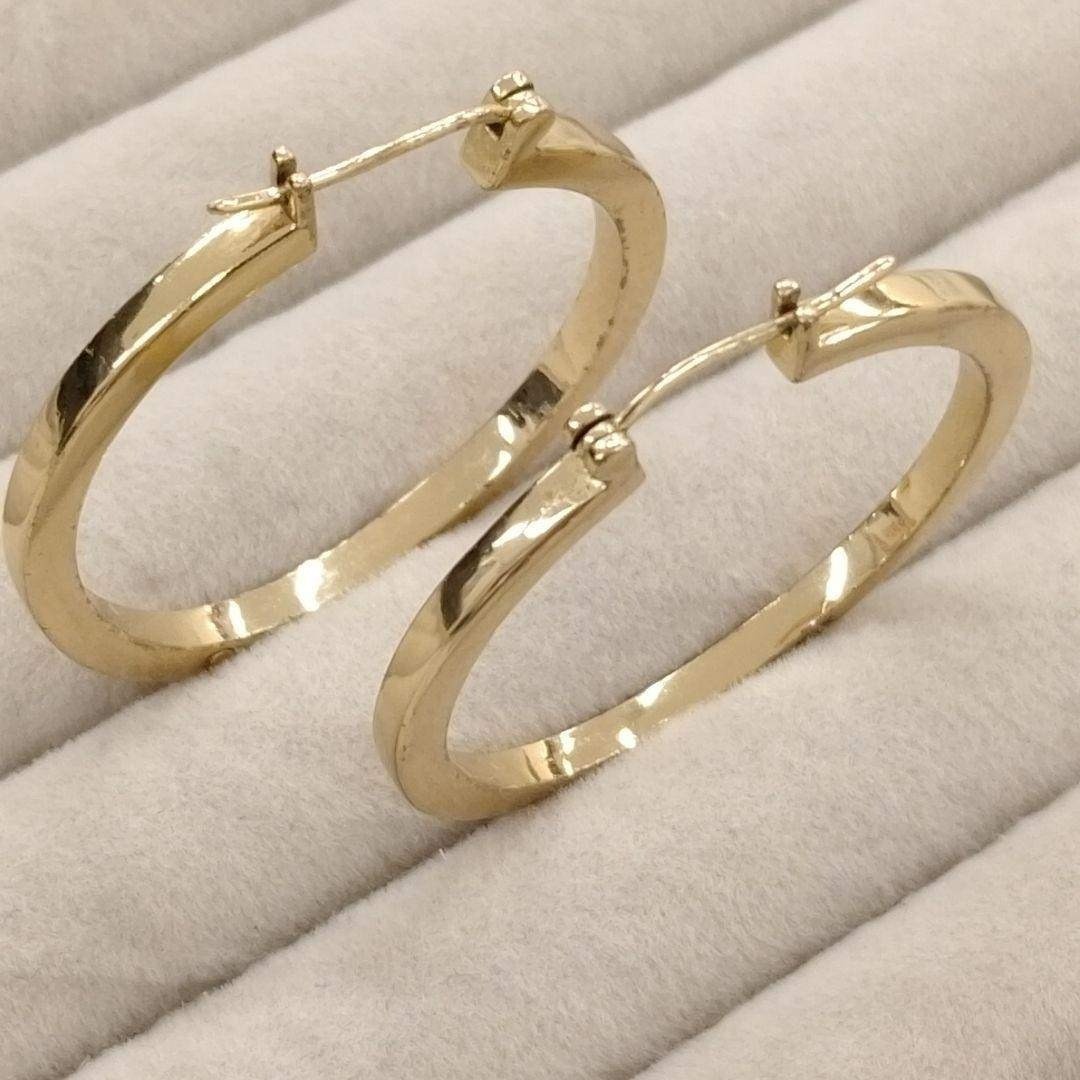 Near mint COACH logo x gold large hoop earrings