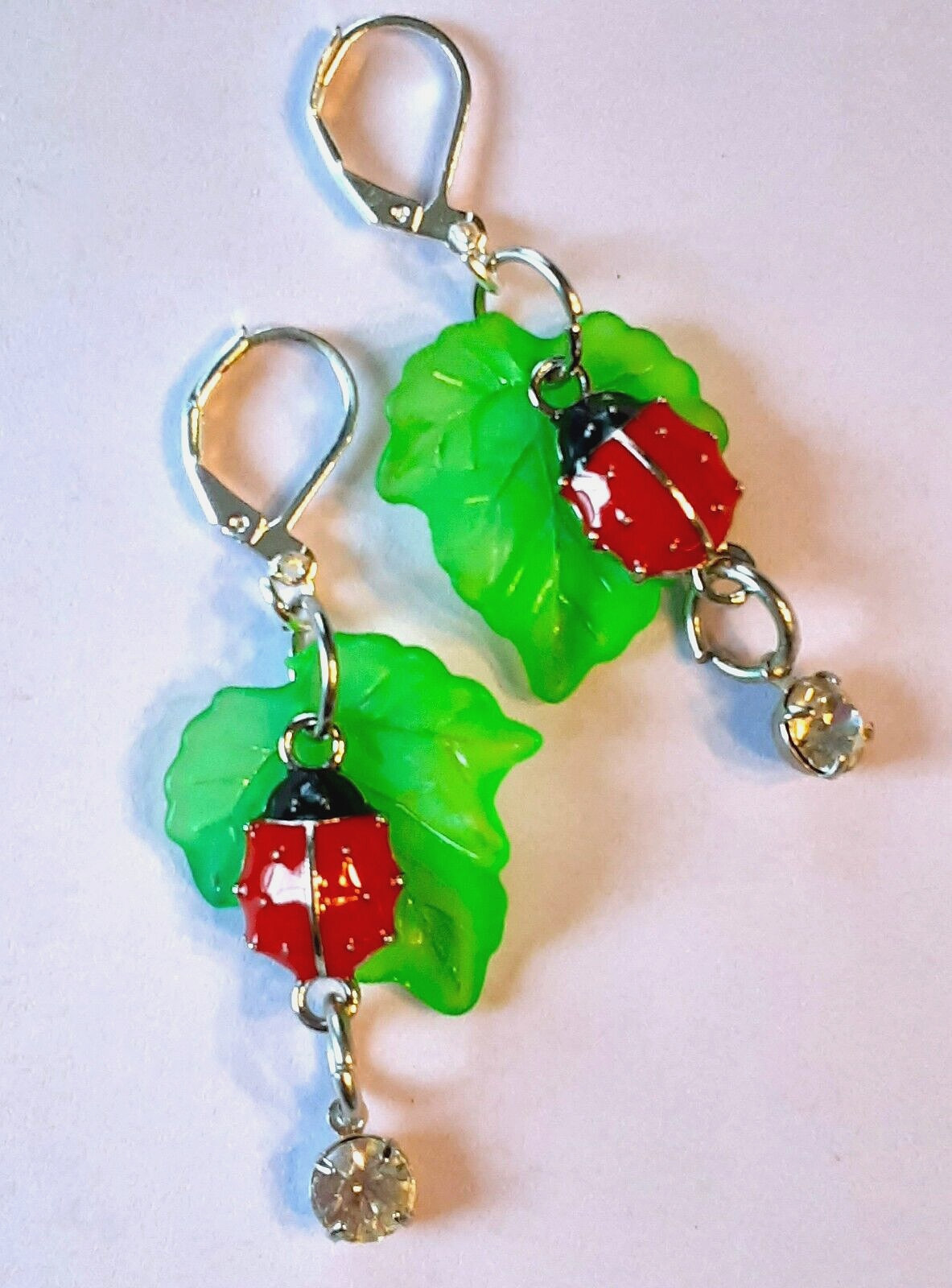 GREEN LEAVES with LADY BUG dangle earring SP LEVER BACK XX