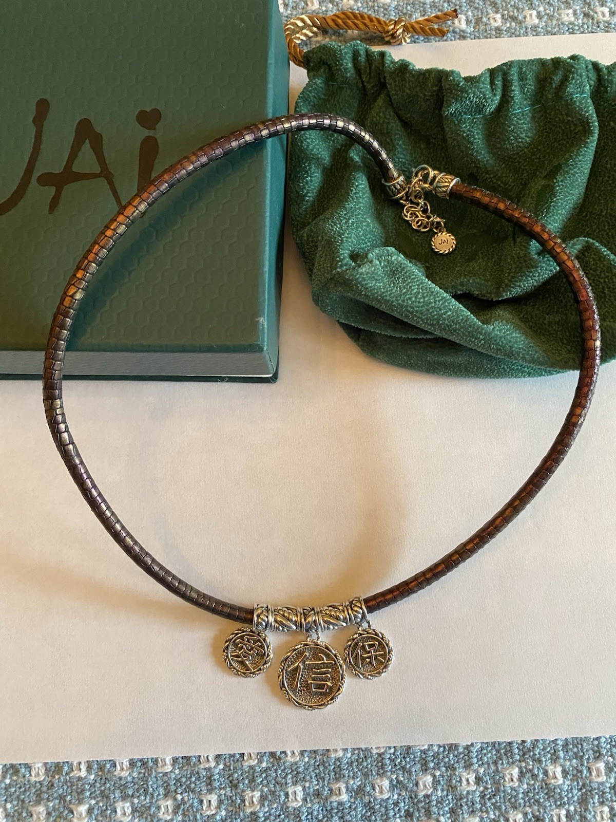 Jai Brown Leather Cord Necklace with sterling silver coin drops.
