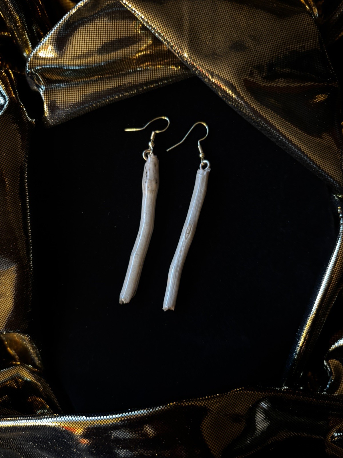 One of a kind jewelry made from real pieces of wood coated in resin