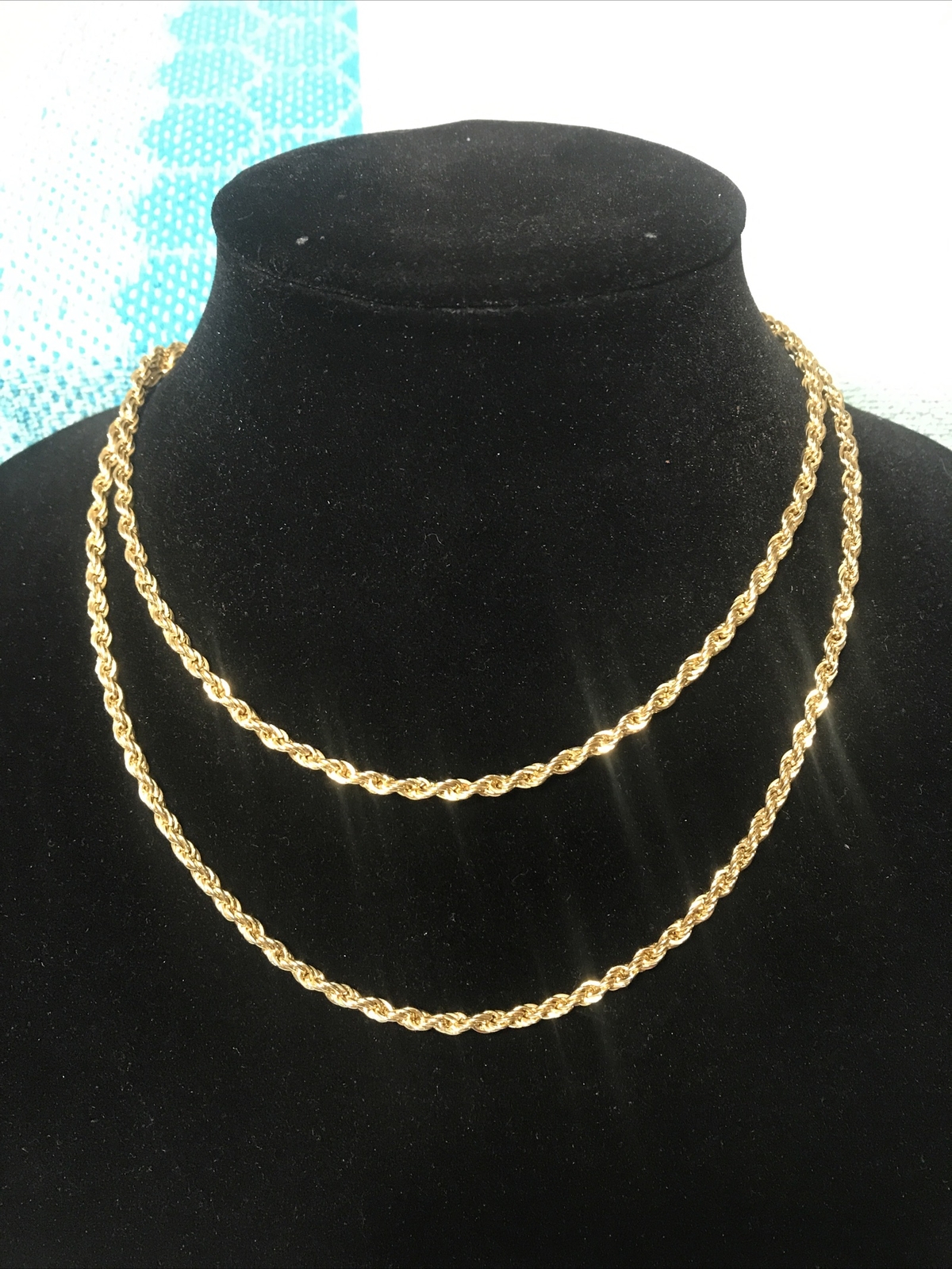 35in. Long bright gold tone twisted rope chain necklace with lobster claw clasp