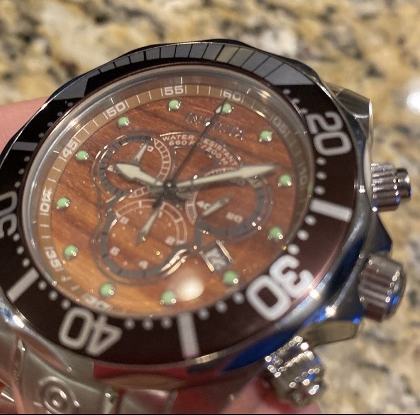 Invicta Pro Diver men’s quartz watch with a wood grain dial model 0164.