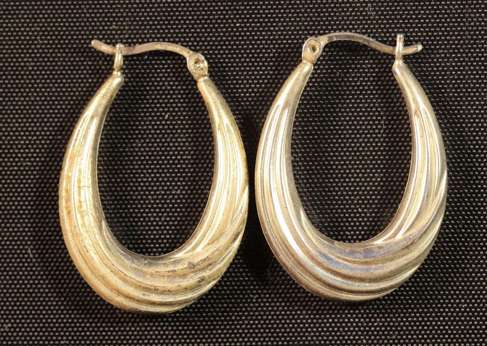 Vintage Sterling Silver oval hoop earrings with twist design and snap clasp