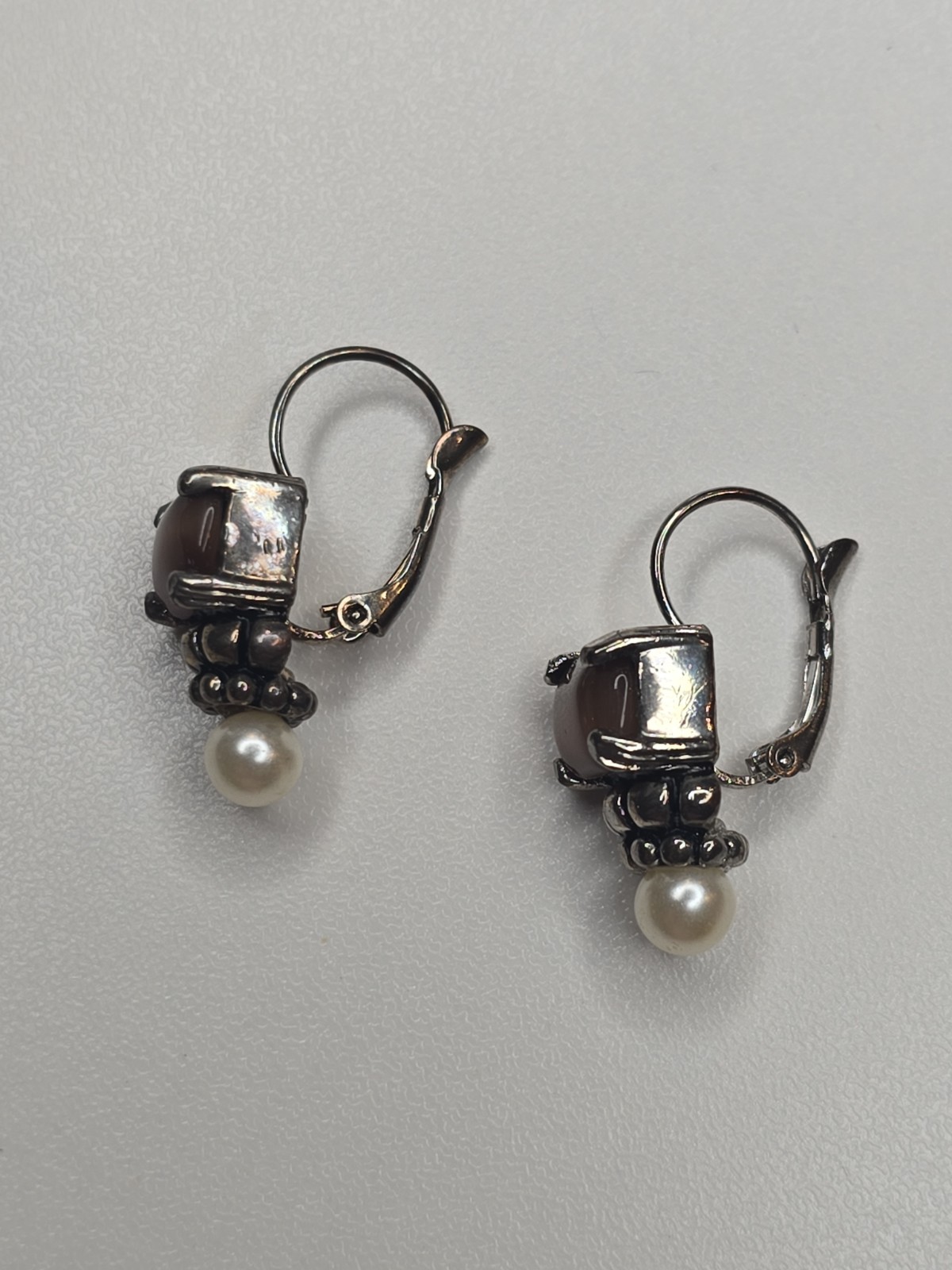 sterling silver Lagos earrings, smoky quartz stone and pearl accent.