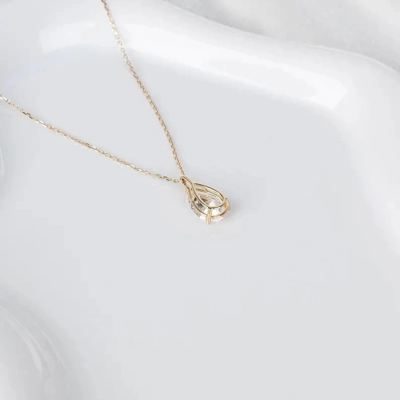 2CT Pear-Cut Moissanite Solitaire Pendant 14K Yellow Gold Plated 18″ Chain