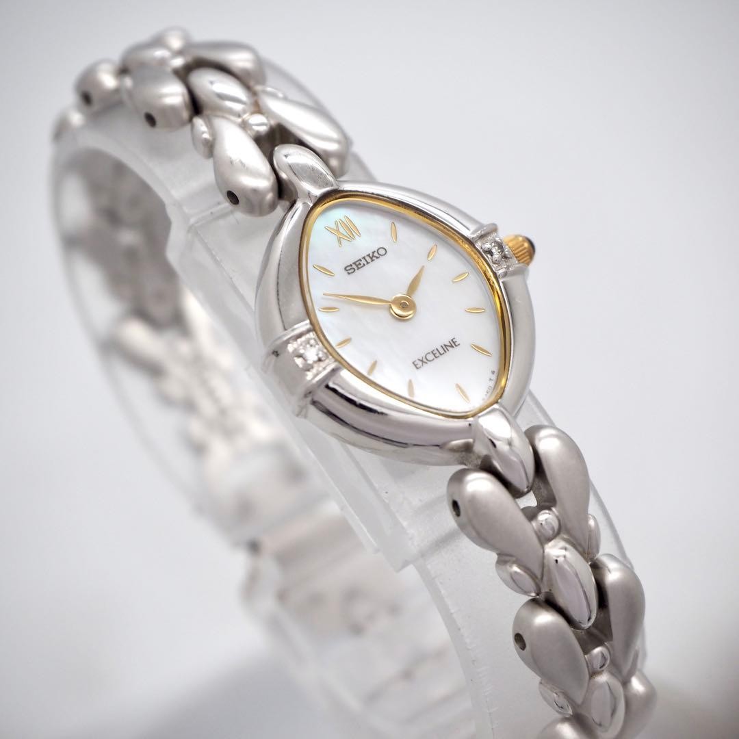 Seiko Exceline 2P Diamond Shell Oval White Quartz Ladies Watch Japan 0715240