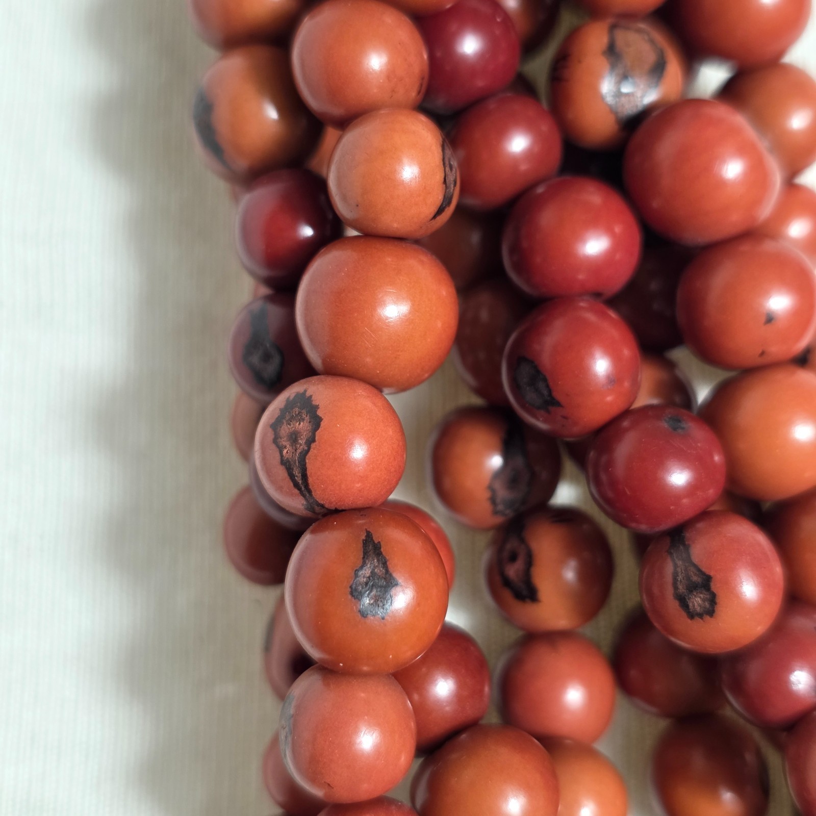 Multi-Strand Dyed Coral Colored Acai Seed Bead Necklace Gold Seed Bead Accents