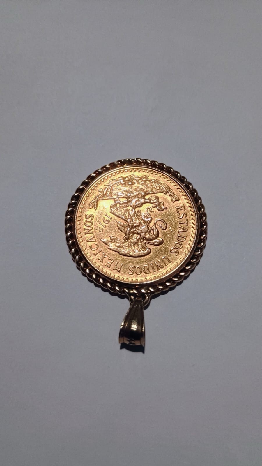 1918 Mexican “Veinte Pesos” gold coin pendant, featuring a 14k gold bezel