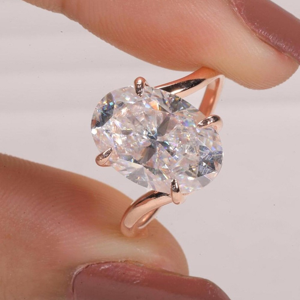 5.50 CTW Oval Cut VVS1 Moissanite Bypass Engagement Ring In 14k Rose Gold Plated