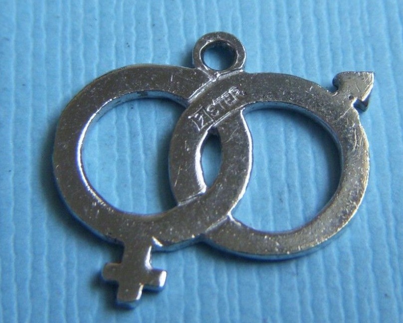 Vintage interlocking male and female symbols sterling charm