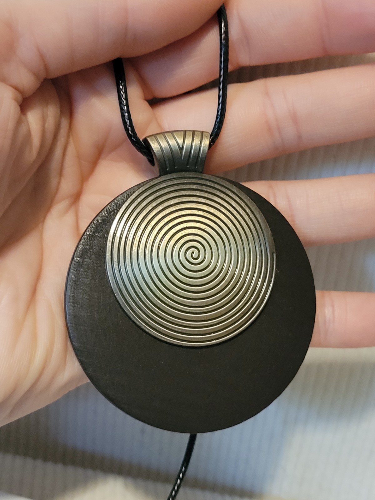 New Large Round Wooden And Metal Spiral Pendant On A Black Cord Type Chain