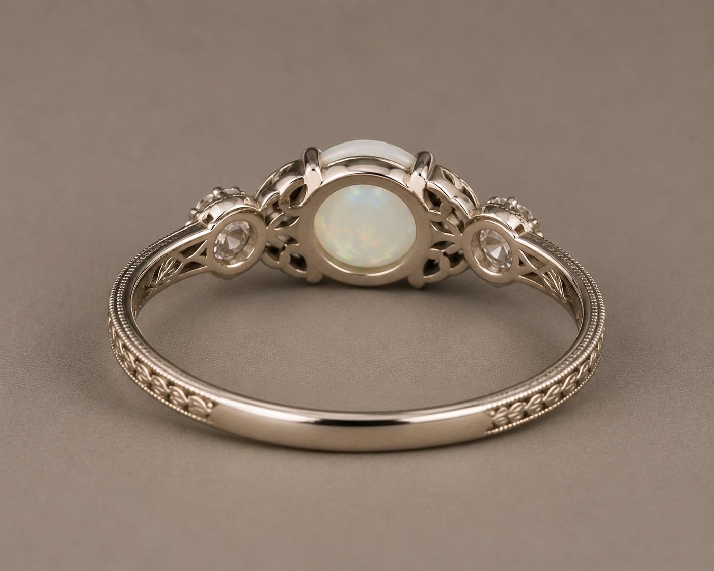Handcrafted White Ethiopian Opal Ring with Moissanite Accents & Vintage Leaf