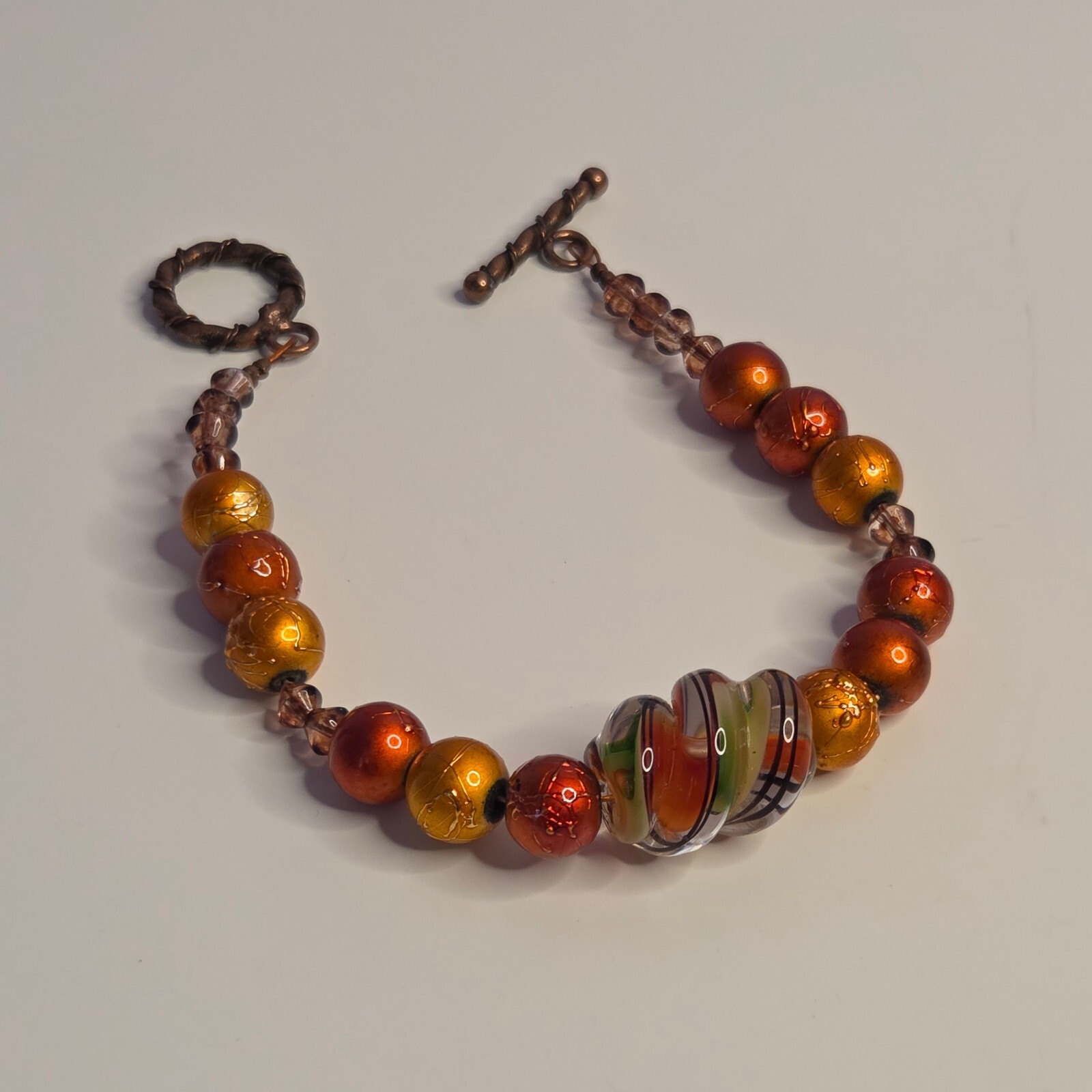 Artsy Y2K Boho Red & Orange Bronze Tone Artisan Beaded Bracelet w/ Glass Bead