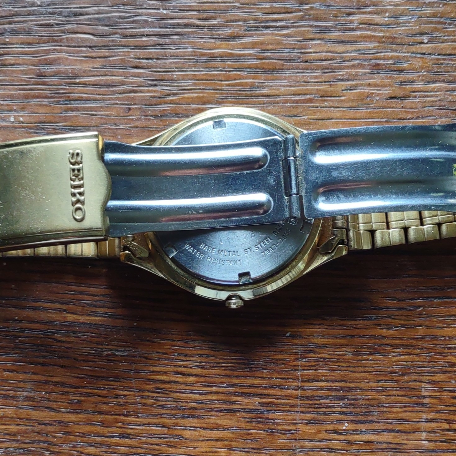 Seiko Quartz Day/Date Black Dial Gold-Tone Stainless Steel Bracelet Watch