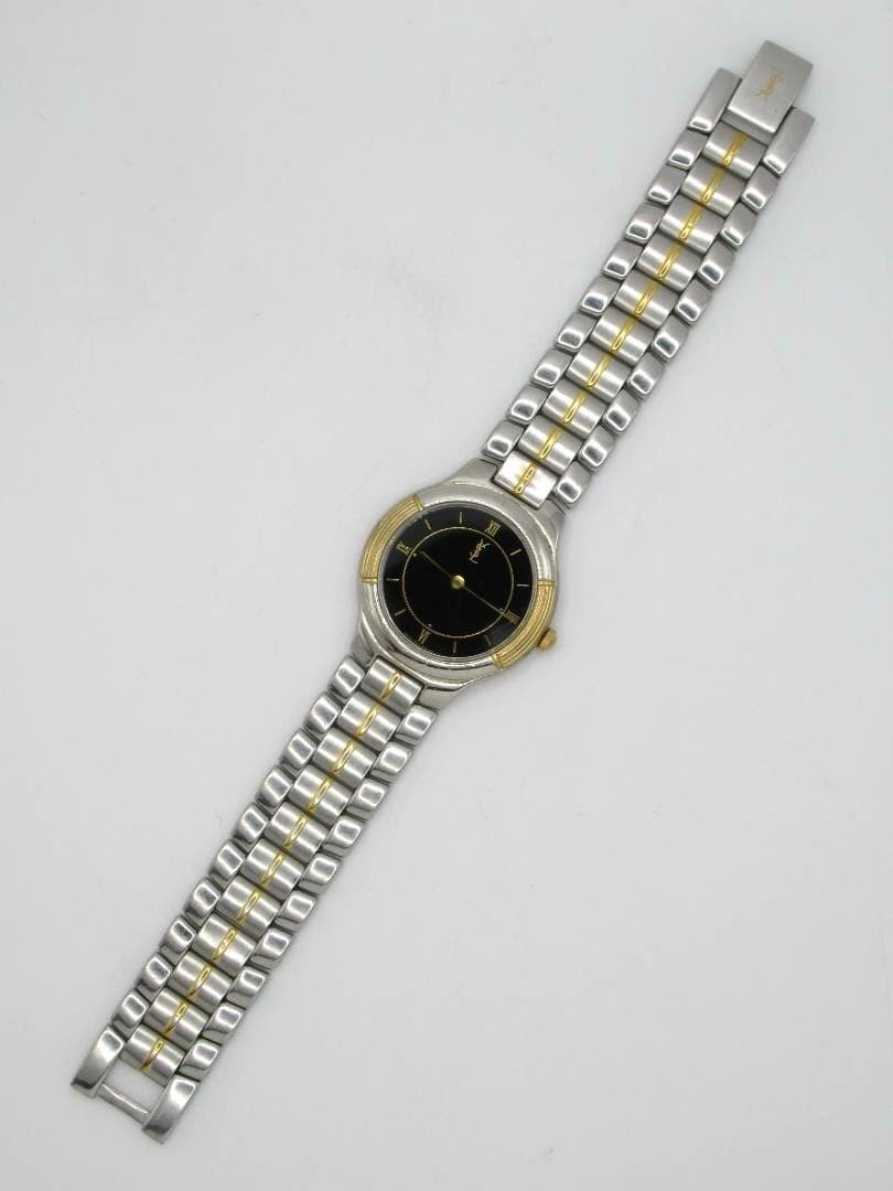 Yves Saint Laurent watch 4620-E66661Y, black dial, working condition.