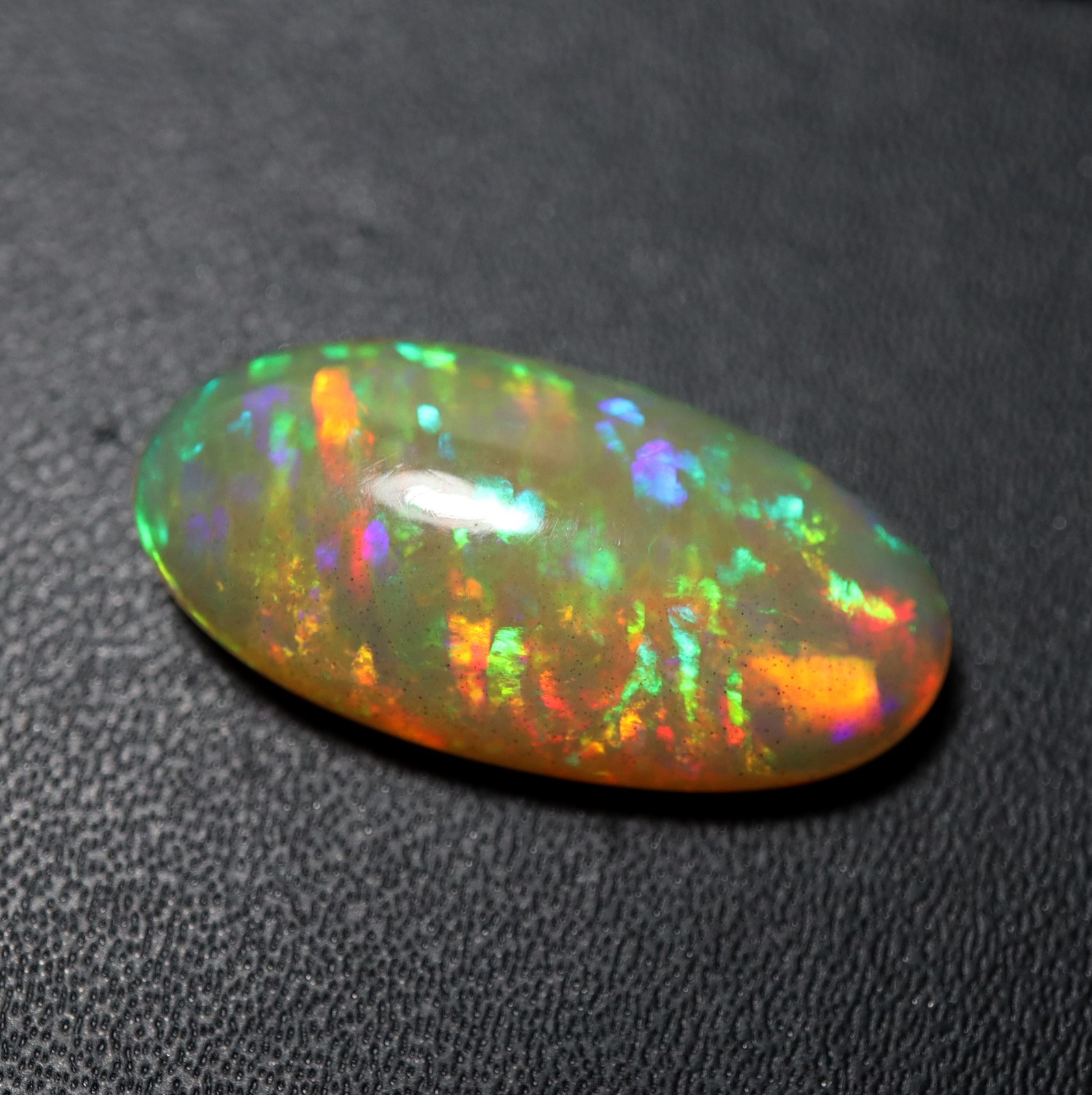 8.8Cts Natural AAA Ethiopian Opal Oval Flashy Rainbow Fire Cabochon 23.1×11.8 MM