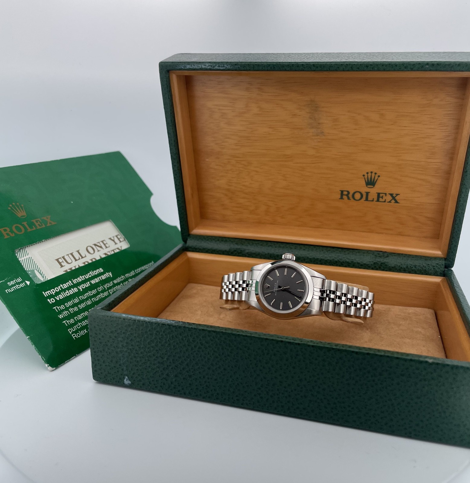 Rolex 67180 Ladies Oyster Perpetual Silver Dial w/ Box & Papers