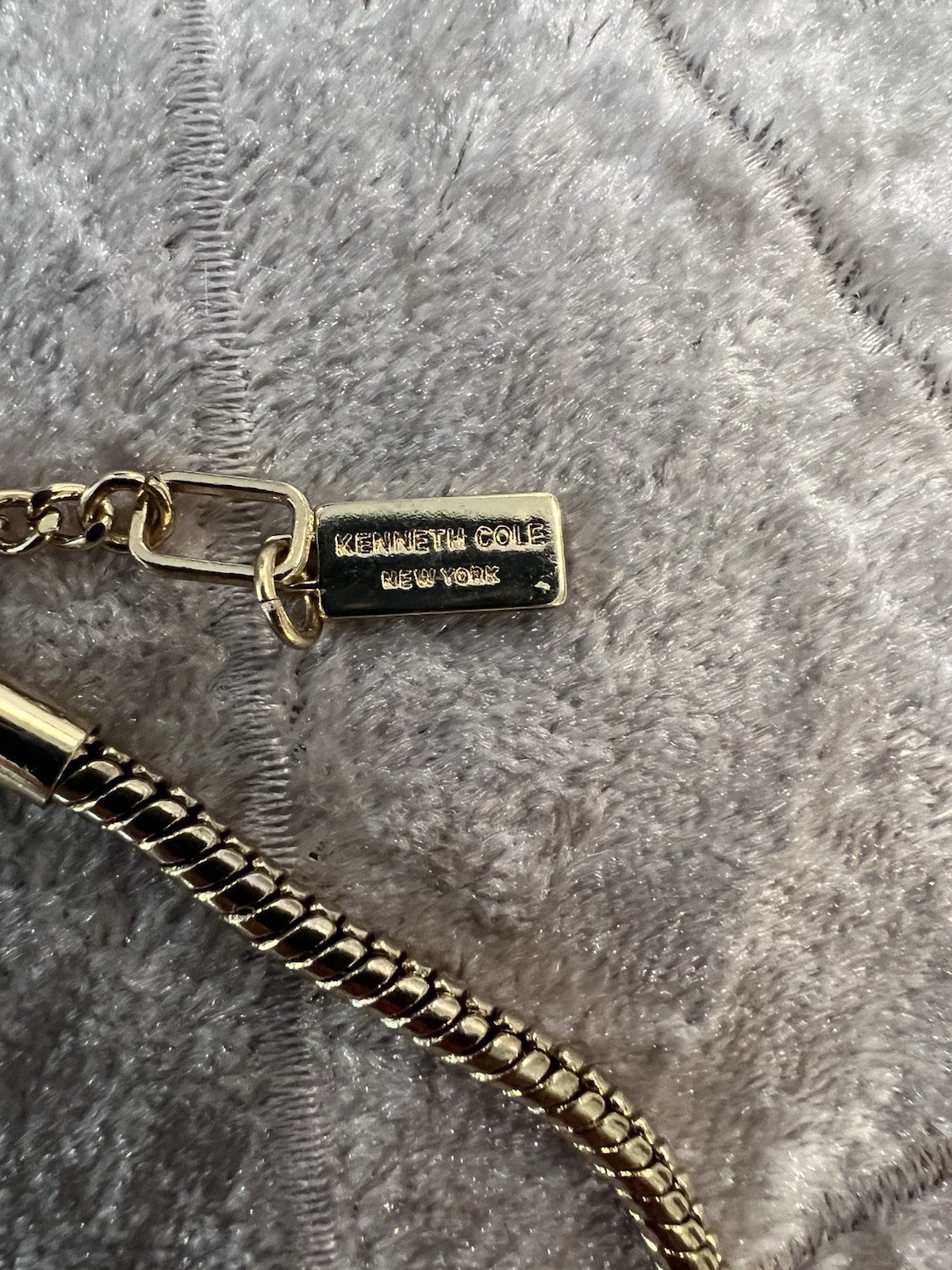 Kenneth Cole Necklace Double Serpent Chain Sporting A Large Gold Square Pendant