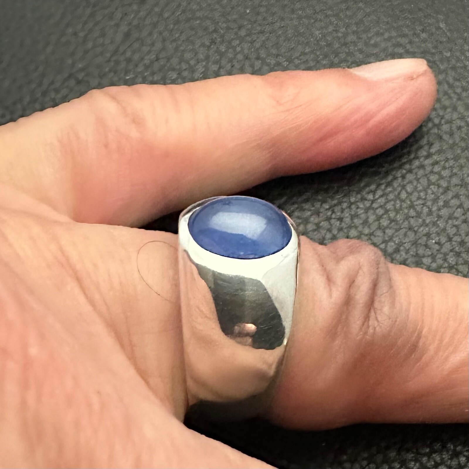 MJG STERLING SILVER BEZEL RING. 12 x 10mm OVAL LAB STAR SAPPHIRE. SZ 9.5