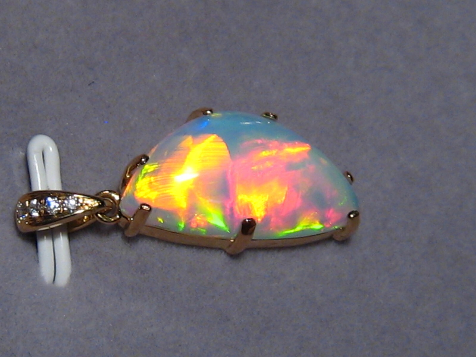 5.1 ct. Ethiopian Gem Opal and Diamond Pendant , 18 k Yellow Gold